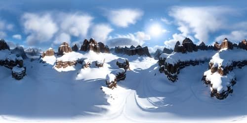vast mountainscape with snowy peaks