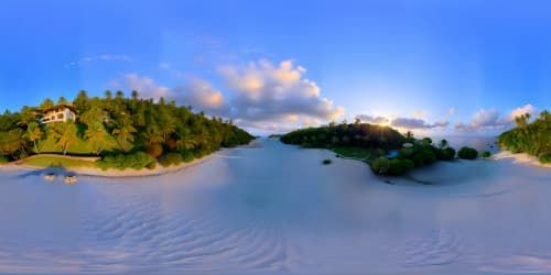 VR360 ultra-high resolution, hillside panorama, tropical beach paradise. Unobstructed VR360 view, clear blue sea, sun kissing the horizon, sky adorned with pastel hues. Style: Masterpiece, best quality