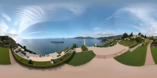 Ultra-high-resolution VR360 panorama, hilltop elegance, ocean spectacle. VR360 horizon, clay-hued village wrapped in sea colors. Masterful patio viewpoint, adjacent hamlet panorama. Astonishing breadth, prime quality, hillside allure.