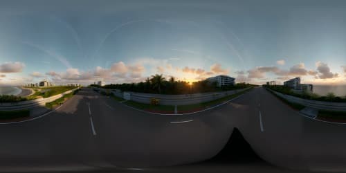 fancy cars on the road of Miami (seaside highway) sunset scene