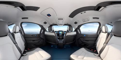 seated in an airliner in economy class with backseat tv