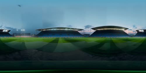 Ultra high-res masterpiece of Elland Road Stadium, imposing grandeur, detailed architecture, field's lush green, stadium lights against evening sky. VR360 Pixar-style, ensuring visual delight.